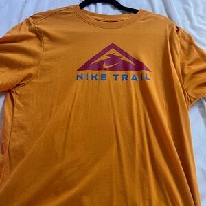 Nike Orange Trail Graphic Tee with Purple and Blue Logo